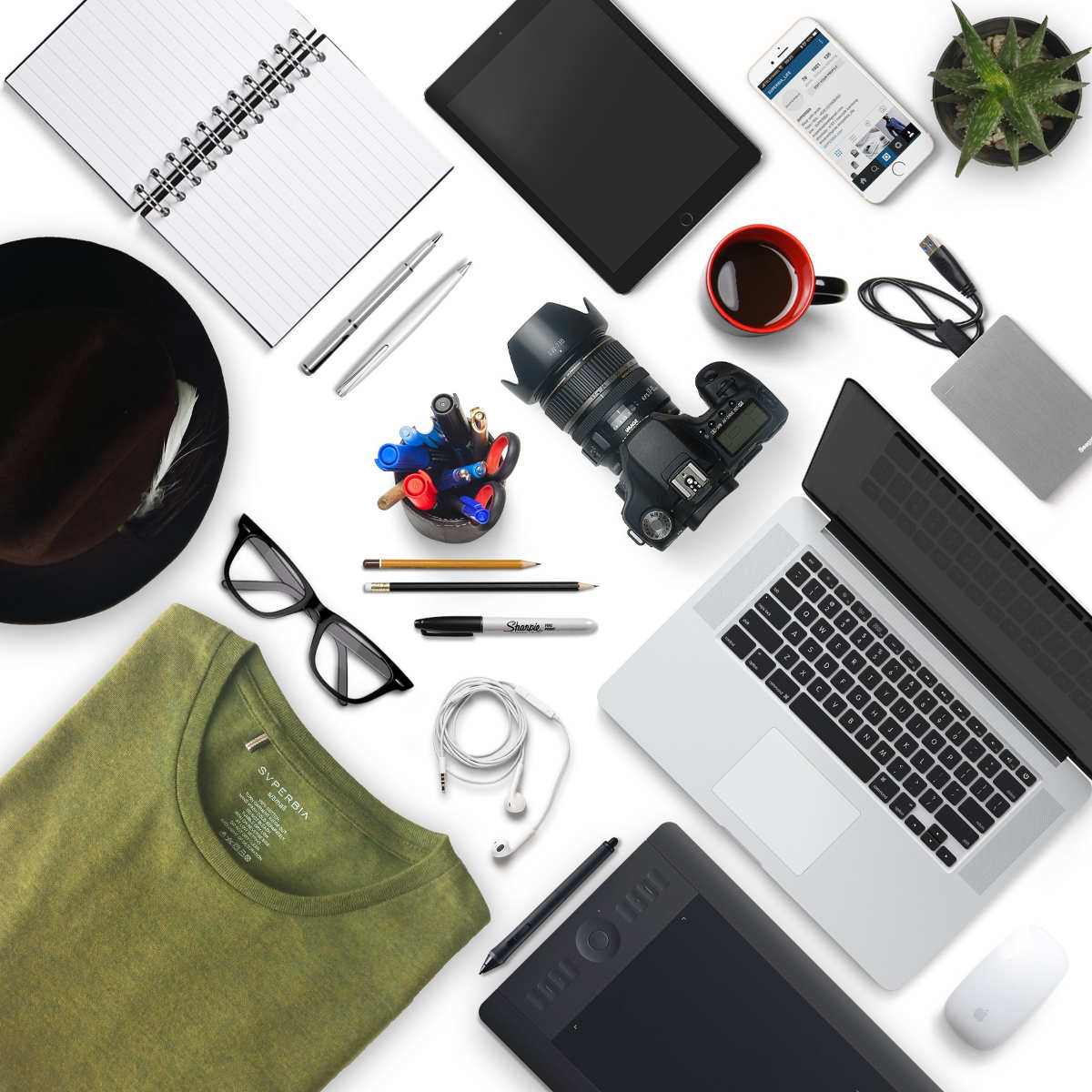A notebook, a tablet, a phone, a camera, a laptop computer and many other items.